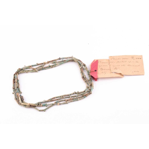 84 - An Egyptian style mummy bead necklace, possibly restrung, comprising vari-shape turquoise-coloured f... 