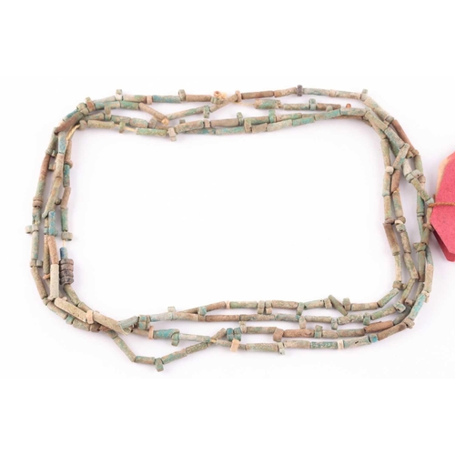 84 - An Egyptian style mummy bead necklace, possibly restrung, comprising vari-shape turquoise-coloured f... 