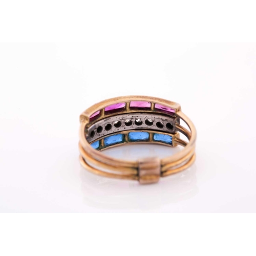 85 - A yellow metal, diamond, and paste stone triple band ring, fastened to underside, set with a central... 