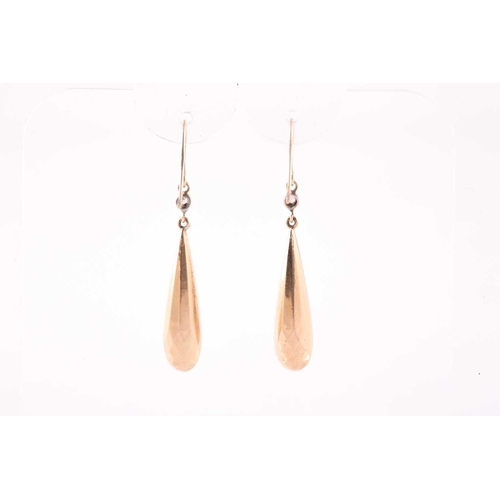 93 - A pair of yellow metal and diamond drop earrings, in the Victorian style, set with hollow tapered dr... 