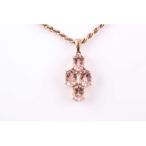 97 - A 9ct yellow gold and morganite pendant, set with four mixed oval-cut morganites with chequerboard f... 