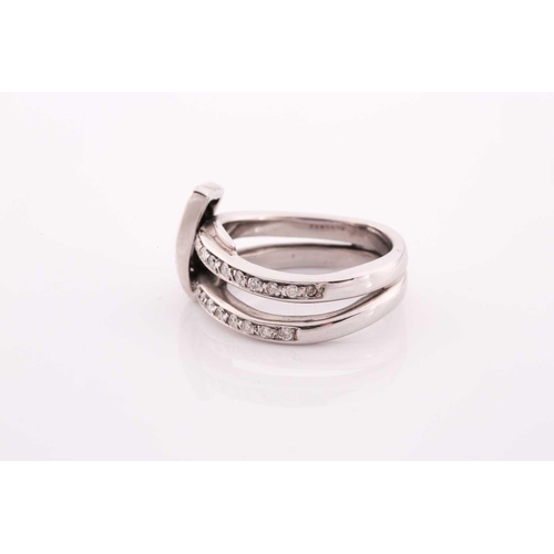 105 - An unusual white metal and diamond ring, of folded knot design, inset with round brilliant-cut diamo... 