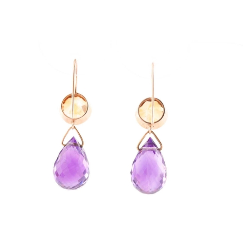 116 - A pair of amethyst and citrine pendant earrings, the faceted pear shaped amythests suspended from ci... 