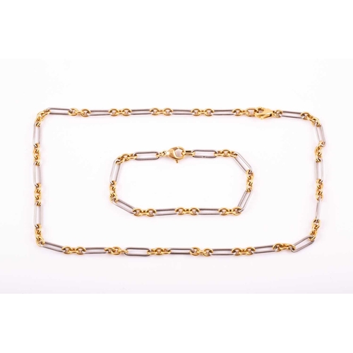 119 - A bi-coloured 18ct gold and platinum necklace and bracelet en suite; fetter and three design, the ne... 