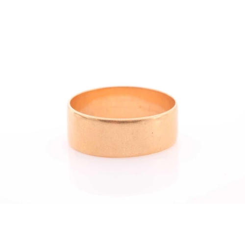 124 - An early 20th century 18ct gold broad wedding band, Birmingham 1912, 8.3mm wide, leading-edge size Z... 