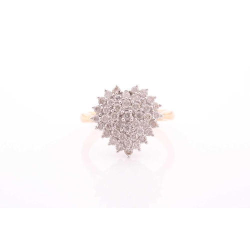 128 - An 18ct yellow gold and diamond ring, the heart-shaped cluster set with round brilliant-cut diamonds... 