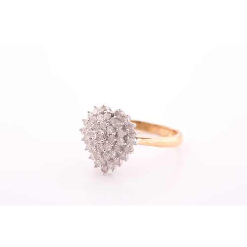 128 - An 18ct yellow gold and diamond ring, the heart-shaped cluster set with round brilliant-cut diamonds... 