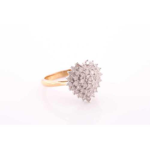 128 - An 18ct yellow gold and diamond ring, the heart-shaped cluster set with round brilliant-cut diamonds... 