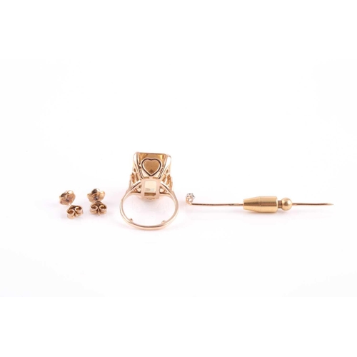 142 - A 1960’s 9ct gold and citrine ring, a diamond stick pin and a pair of diamond stud earrings; the rin... 
