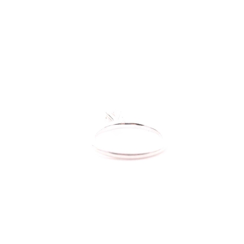 146 - An 18ct white gold and solitaire diamond ring, set with a round brilliant-cut diamond, approximate c... 