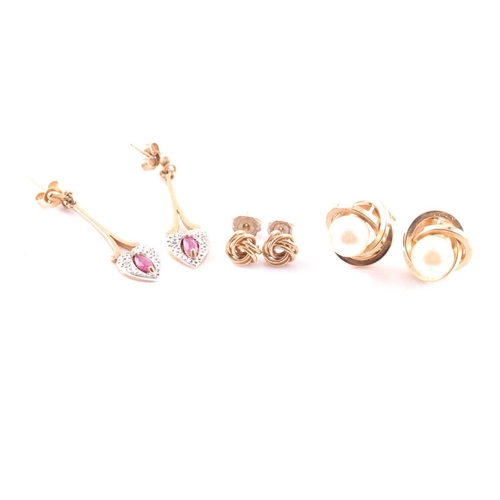 168 - A pair of ruby and diamond pendant earrings in 9 carat gold mounts; a pair of knot earrings and a pa... 