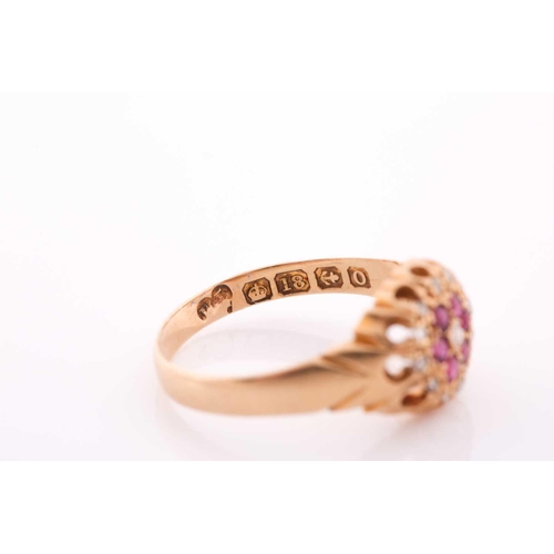 209 - An 18ct yellow gold, diamond, and ruby floral cluster ring, the claw-raised mount pave-set with mixe... 