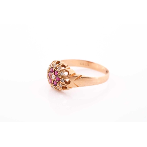 209 - An 18ct yellow gold, diamond, and ruby floral cluster ring, the claw-raised mount pave-set with mixe... 