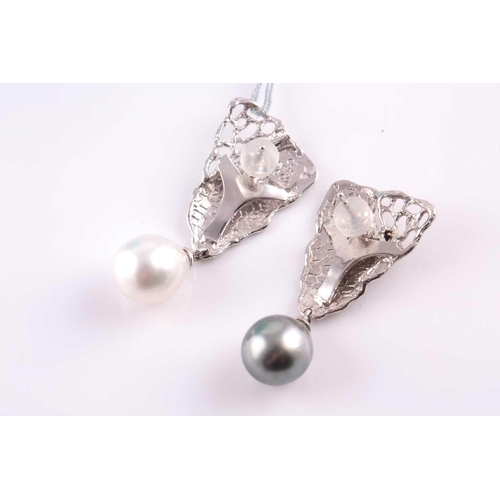 236 - A pair of silver, diamond, and South Sea pearl earrings, each with naturalistic handmade mount, with... 