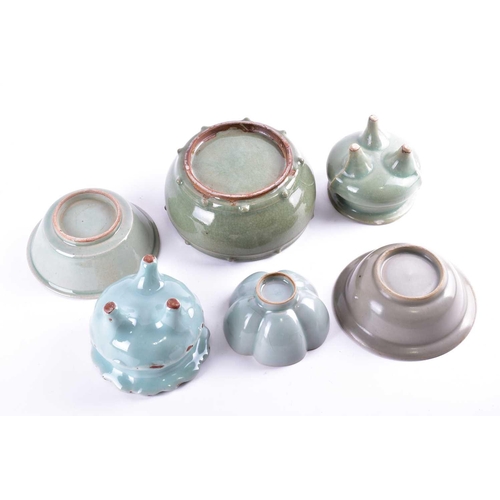 103 - A group of Yuan and later Longquan style celadon wares, comprising a twin fish bowl, with everted ri... 