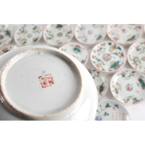 111 - A large quantity of Chinese famille rose saucers, early 20th century, comprising seventeen with a pe... 