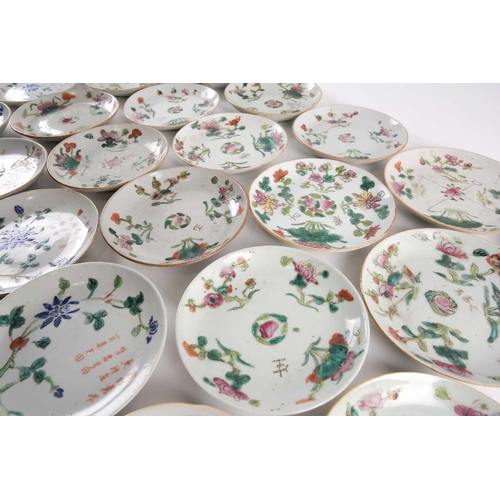 111 - A large quantity of Chinese famille rose saucers, early 20th century, comprising seventeen with a pe... 