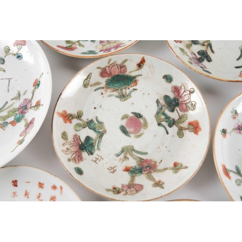 111 - A large quantity of Chinese famille rose saucers, early 20th century, comprising seventeen with a pe... 