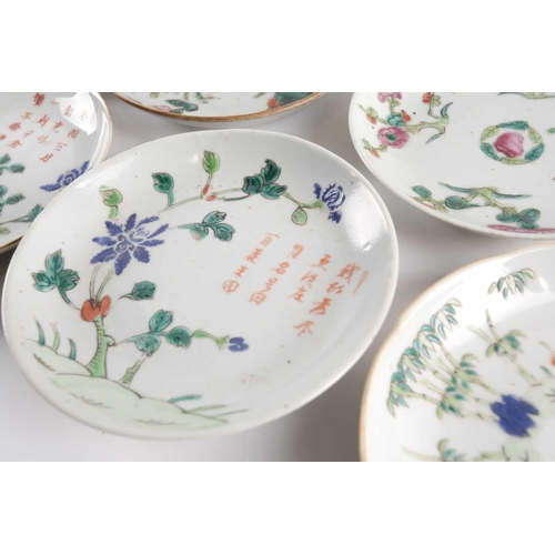 111 - A large quantity of Chinese famille rose saucers, early 20th century, comprising seventeen with a pe... 