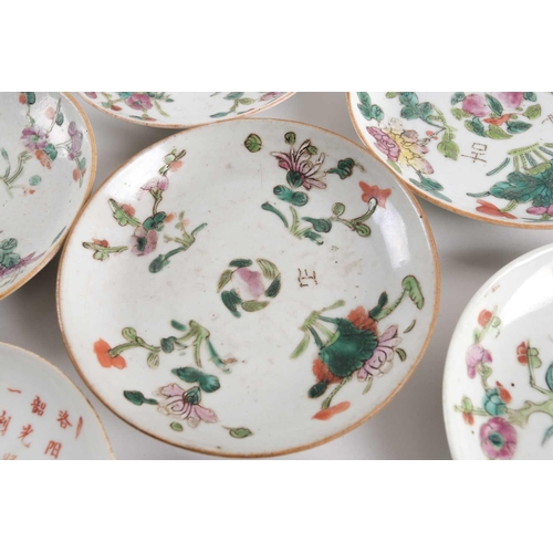 111 - A large quantity of Chinese famille rose saucers, early 20th century, comprising seventeen with a pe... 