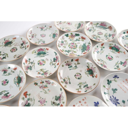 111 - A large quantity of Chinese famille rose saucers, early 20th century, comprising seventeen with a pe... 