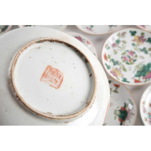 111 - A large quantity of Chinese famille rose saucers, early 20th century, comprising seventeen with a pe... 