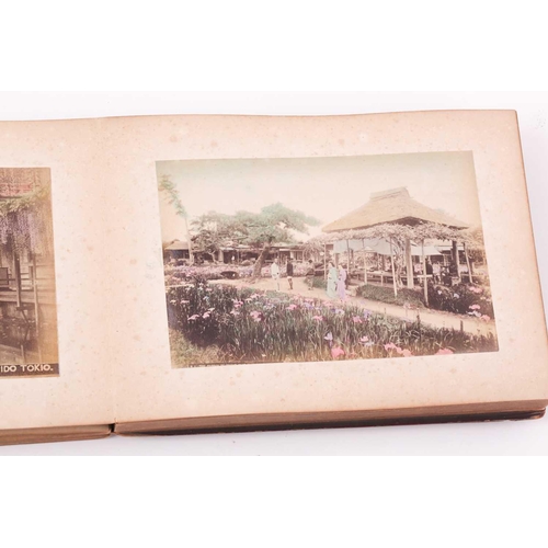 117 - A Japanese shibayama concertina photograph album, late Meiji, containing fifty hand coloured photogr... 