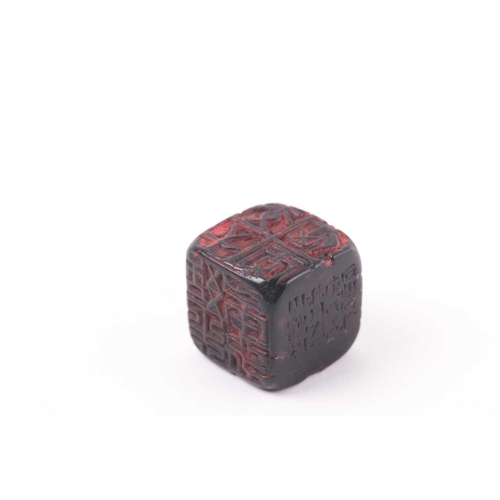 121 - A Chinese red soapstone five sided seal, of square form with an inscribed poem, 2.9cm