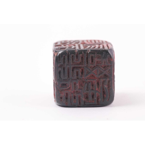 121 - A Chinese red soapstone five sided seal, of square form with an inscribed poem, 2.9cm