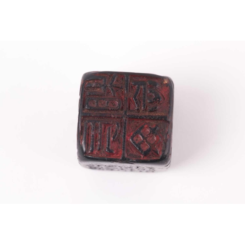 121 - A Chinese red soapstone five sided seal, of square form with an inscribed poem, 2.9cm