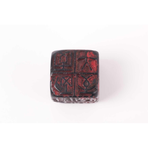 121 - A Chinese red soapstone five sided seal, of square form with an inscribed poem, 2.9cm