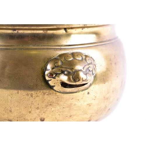 122 - A large Chinese bronze censer, Qing, of circular form with everted rim, with applied lion mask handl... 