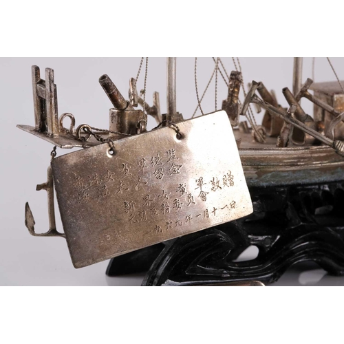 126 - A Chinese silver model of an armed boat, early 20th century, the three masted vessel with deck canno... 