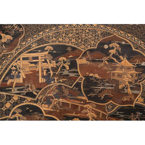 131 - A large Japanese lacquered bronze charger by Kuroda Kiichhi, Kyoto, late Meiji period, the centre wi... 