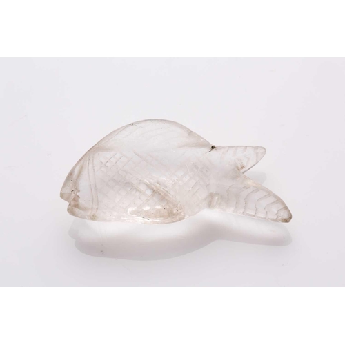 136 - A possibly Chinese carved rock crystal figure of a fish with engraved detail. 5 cm long x 2.5 cm dee... 