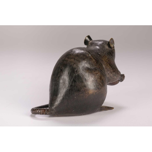 140 - A Japanese bronze rat, Meiji period, seated on its haunches, holding a chestnut, kakihan to base, 9.... 