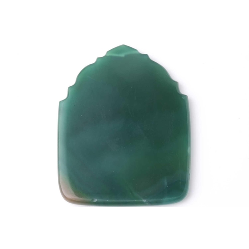 142 - A probably Indian or Iranian green agate pendant of arched arabesque form with engraved probably dev... 