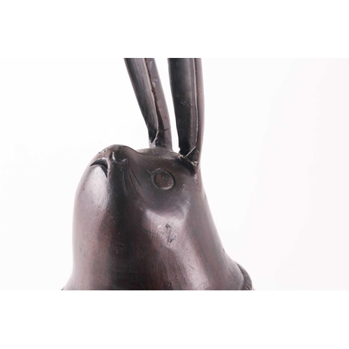 146 - A Japanese bronze incense burner, Meiji period, modelled as a moon gazing hare, a bell attached to i... 