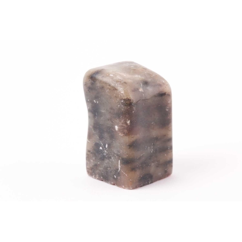 148 - A Chinese soapstone seal, Qing, of rectangular form, the stone shaped to fit a hand, the matrix with... 