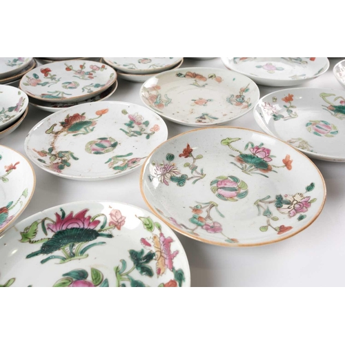 152 - A large quantity of Chinese famille rose saucers, early 20th century, painted with a peach to the ce... 