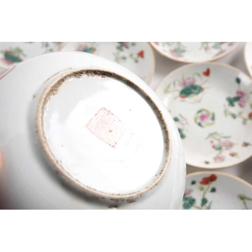 152 - A large quantity of Chinese famille rose saucers, early 20th century, painted with a peach to the ce... 