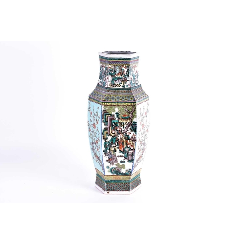 156 - A large Chinese Famille verte hexagonal vase, Qing, 19th century, the neck with a continuous scene o... 