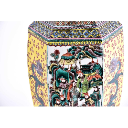 156 - A large Chinese Famille verte hexagonal vase, Qing, 19th century, the neck with a continuous scene o... 