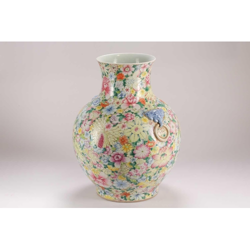 157 - A large Chinese thousand flower vase, Qing, late 19th century, with applied elephant mask and ring h... 