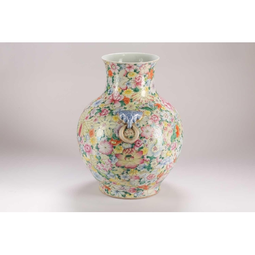 157 - A large Chinese thousand flower vase, Qing, late 19th century, with applied elephant mask and ring h... 