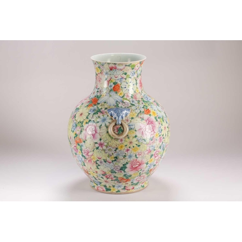 157 - A large Chinese thousand flower vase, Qing, late 19th century, with applied elephant mask and ring h... 