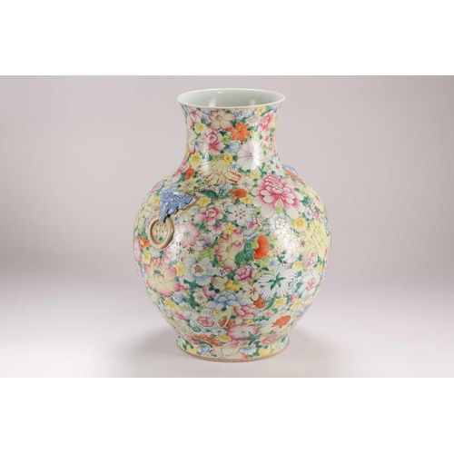 157 - A large Chinese thousand flower vase, Qing, late 19th century, with applied elephant mask and ring h... 