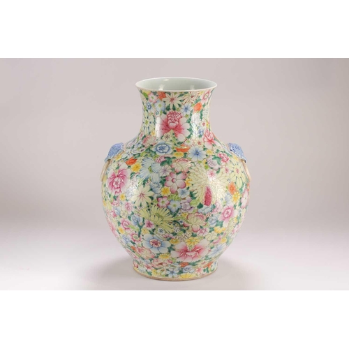 157 - A large Chinese thousand flower vase, Qing, late 19th century, with applied elephant mask and ring h... 