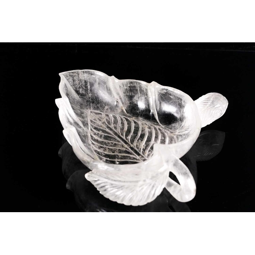 158 - An Indian carved and shaped rock crystal dish of leaf and fruiting vine form 18.5 cm long x 16 cm wi... 