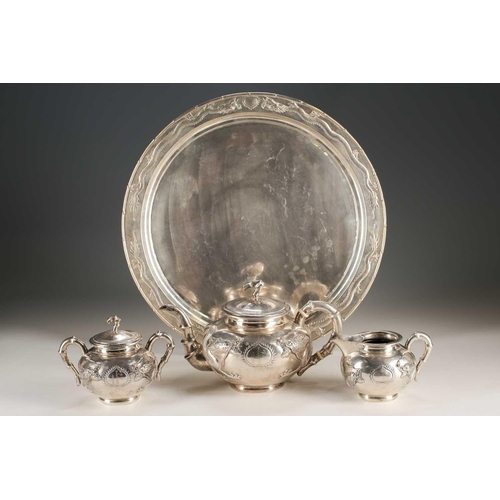 159 - A Chinese silver four piece tea set by Zeewo, early 20th century, each piece embossed with writhing ... 